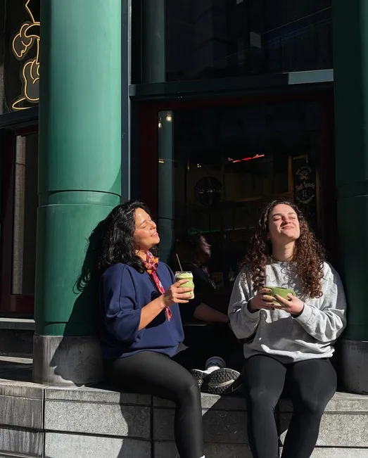 Friends enjoying drinks outside The Unusual